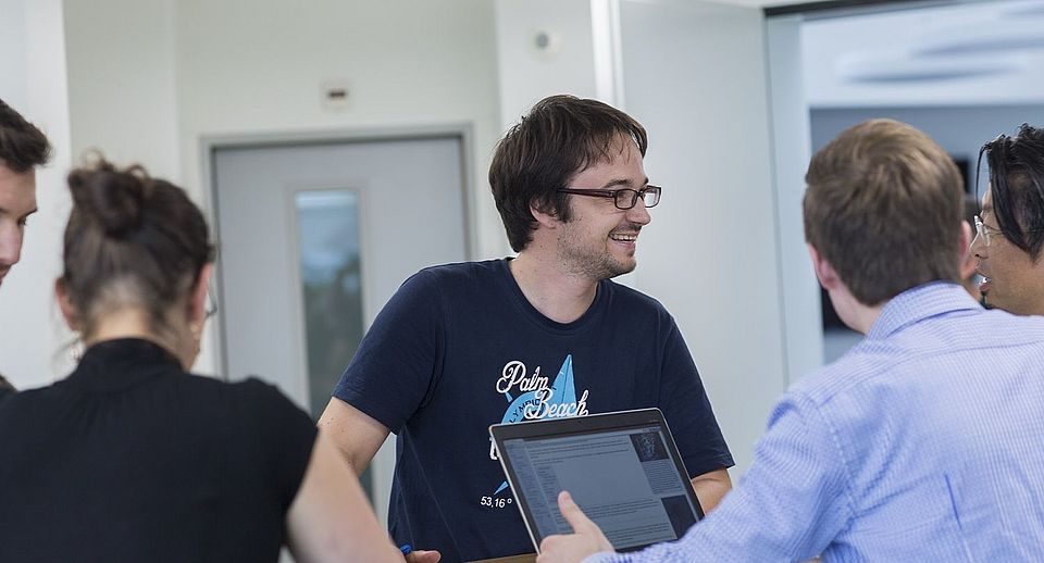 Doktorierende am Diskutieren