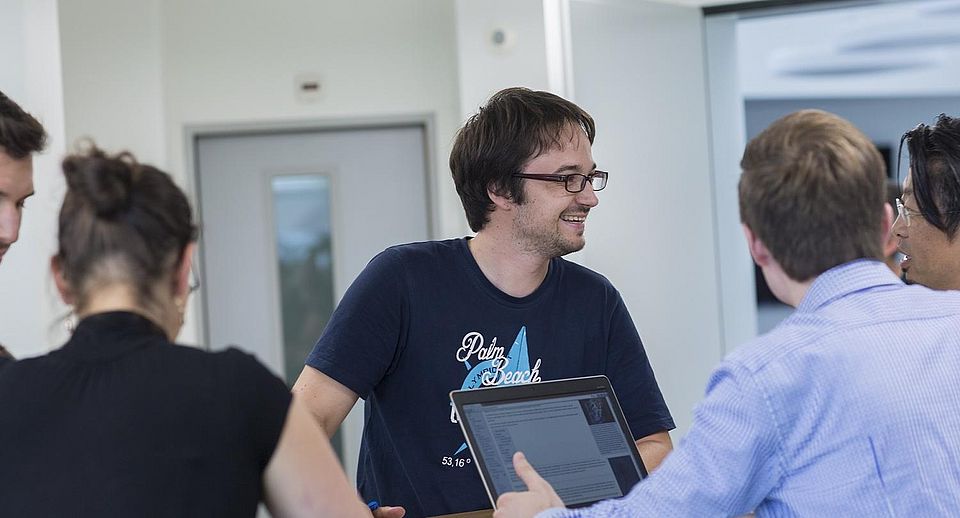 Doktorierende am Diskutieren